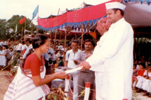 Chief minister of Rajasthan Mr. Ashok Gehlot presenting award for commendable work for blind to CEO.