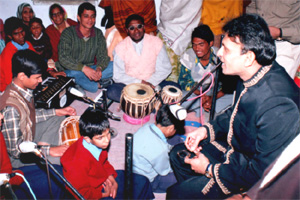 Blind students With famous TV bollywood actor Anu-kapoor during his visit to school.