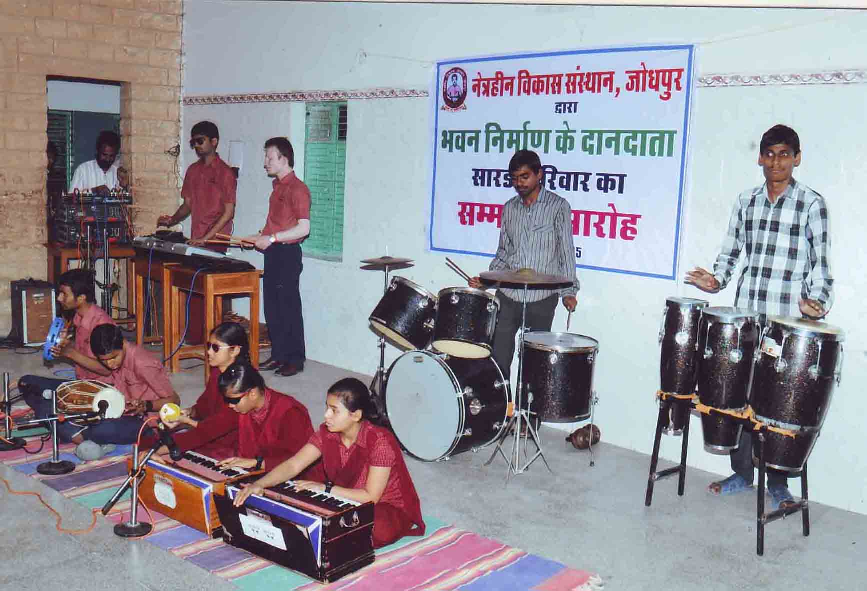 Blind students of our school performing on Stage on the occation of donating the building to Netraheen Vikas Sansthan
